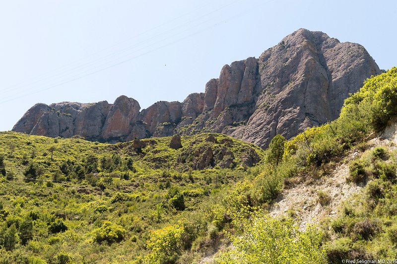 20160601_141949 D4S.jpg - Mallos de Riglos are a set of huge red rock formations that rise up as pillars up to 1000 feet in height.  Its a popular rock climbing place.  Located near Riglos about 25 miles from city of Huesca